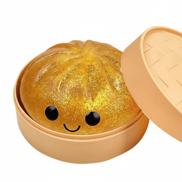 Gele glitter dumpling squishy in bamboebakje