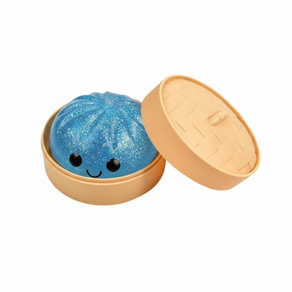 Blauwe glitter dumpling squishy in bamboebakje